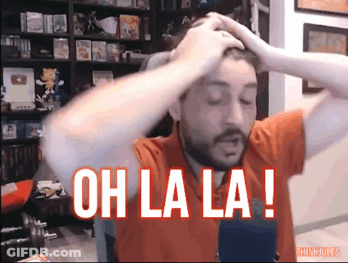 Bearded Man Holding Head Saying Oh La La GIF