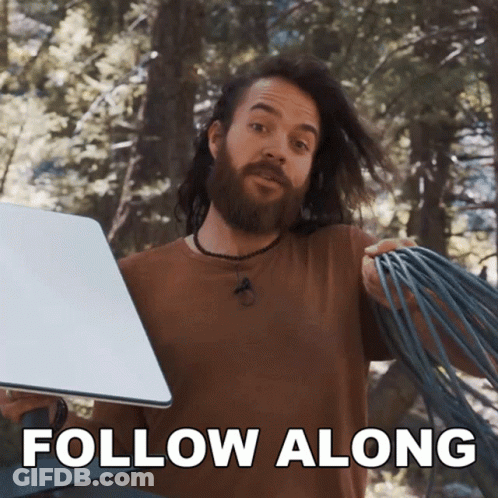 Bearded Man Holding Laptop Saying Follow Along GIF