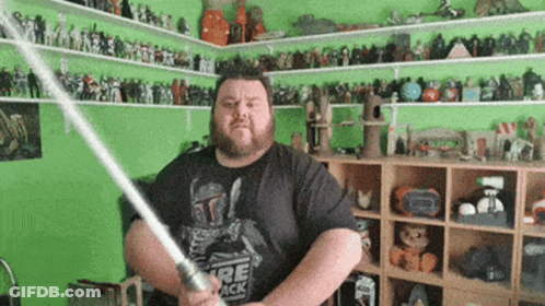Bearded Man Holding Lightsaber GIF