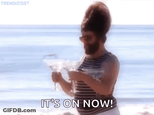 Bearded Man Holding Martini Saying It's On Now GIF