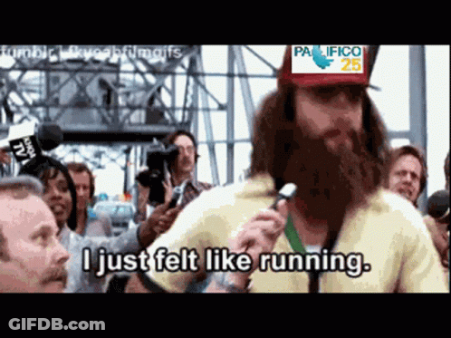 Bearded Man Holding Microphone Saying I Just Felt Like Running GIF