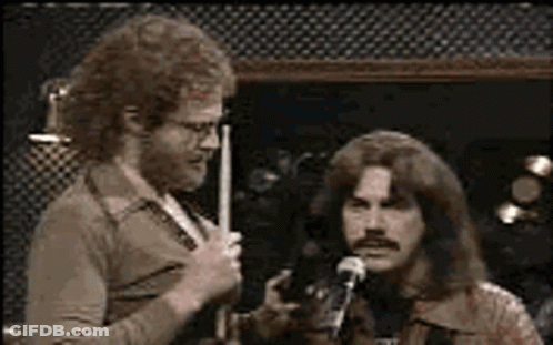 Bearded Man Holding Microphone Saying More Birthday GIF