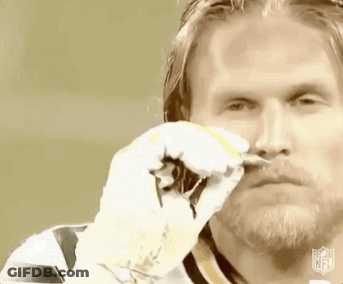 Bearded Man Holding Scissors In Front Of Face GIF