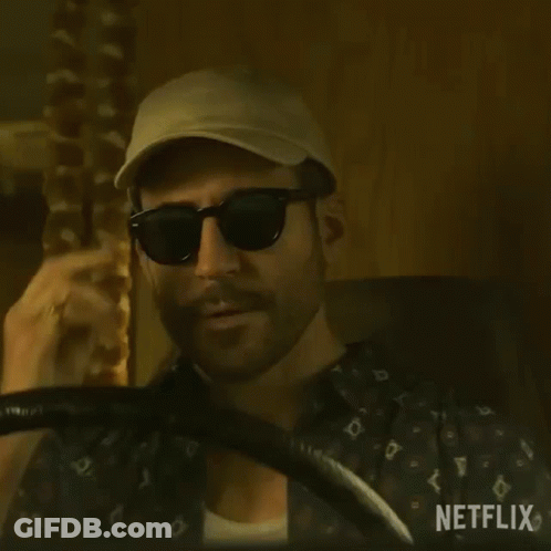 Bearded Man Holding Steering Wheel And Hat GIF