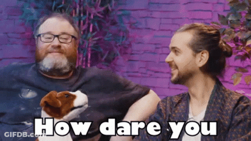 Bearded Man Holding Stuffed Animal How Dare You GIF