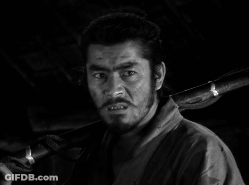 Bearded Man Holding Sword GIF
