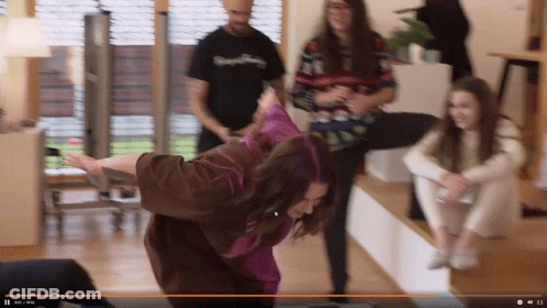 Bearded Man Holding Sword Over Shoulder GIF