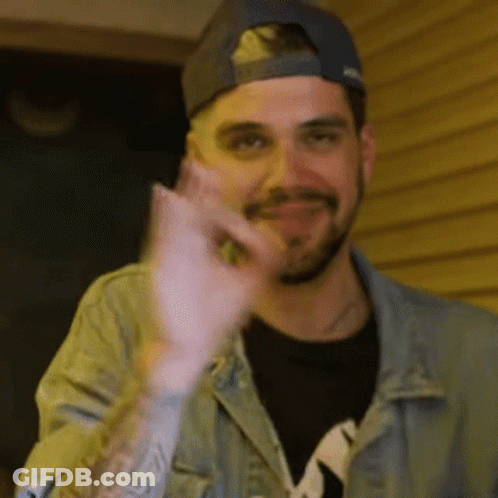 Bearded Man In Baseball Cap And Denim Jacket Thumbs Up GIF