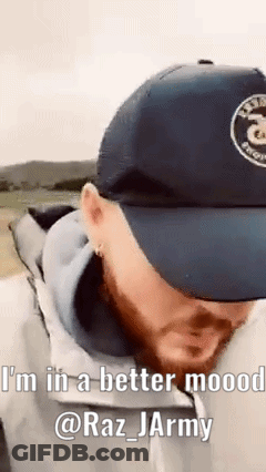 Bearded Man In Baseball Cap And Jacket Talking GIF
