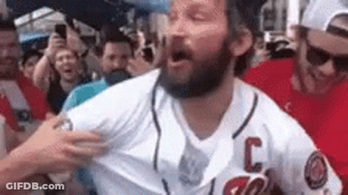 Bearded Man In Baseball Jersey In Front Of Crowd GIF