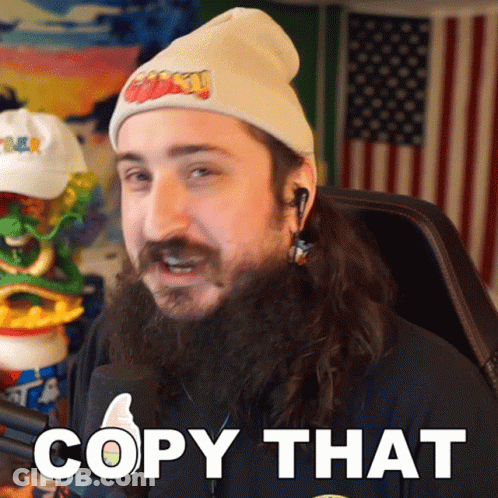 Bearded Man In Beanie And Earbuds Saying Copy That GIF