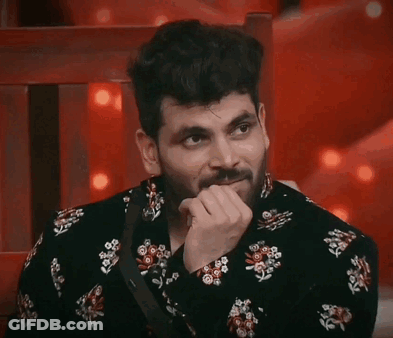 Bearded Man In Black Floral Shirt Hand On Chin GIF