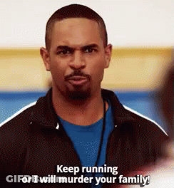 Bearded Man In Black Jacket And Blue Shirt Says Keep Running Or I Will Murder Your Family GIF