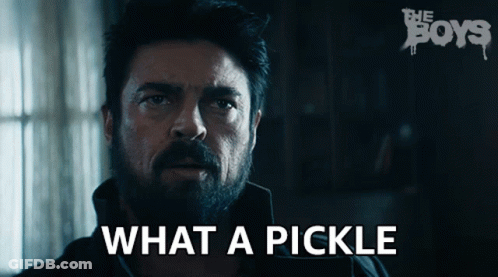 Bearded Man In Black Jacket Looking In Kitchen GIF