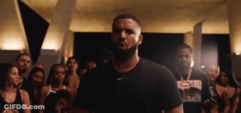 Bearded Man In Black Nike Shirt In Front Of Crowd GIF