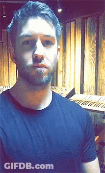 Bearded Man In Black Shirt At Keyboard GIF