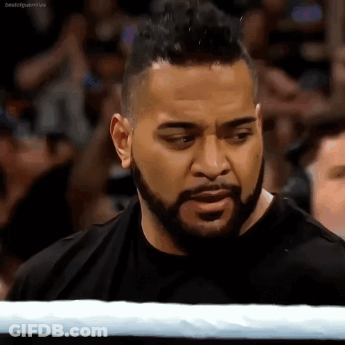 Bearded Man In Black Shirt In Boxing Ring GIF