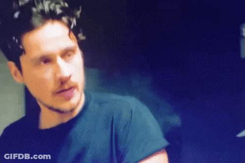 Bearded Man In Black Shirt Looking GIF