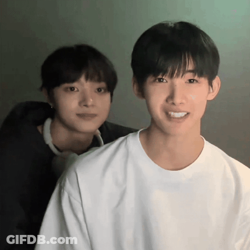 Bearded Man In Black Shirt Looking Down GIF