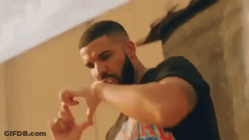 Bearded Man In Black Shirt Making Heart With Hands GIF