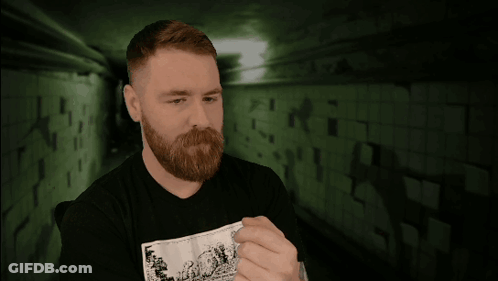 Bearded Man In Black Shirt Saying What GIF