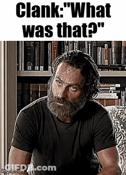 Bearded Man In Black Shirt Sitting GIF