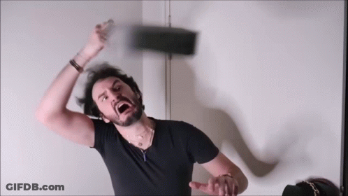Bearded Man In Black Shirt Throwing Something GIF