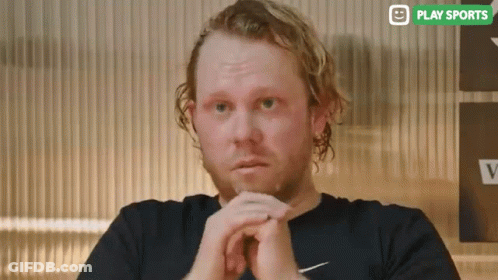Bearded Man In Black Shirt With Nike Logo GIF