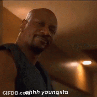 Bearded Man In Black Tank Talking GIF