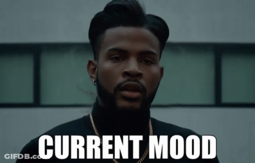 Bearded Man In Black Turtleneck With Current Mood On Face GIF