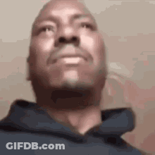 Bearded Man In Blue Hoodie Looking Up GIF