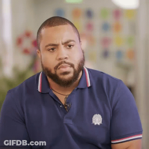 Bearded Man In Blue Polo Shirt With White Emblem GIF