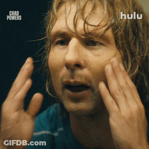 Bearded Man In Blue Shirt And Black Vest Saying Hulu GIF