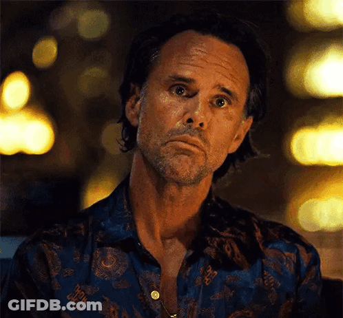 Bearded Man In Blue Shirt Making Face GIF