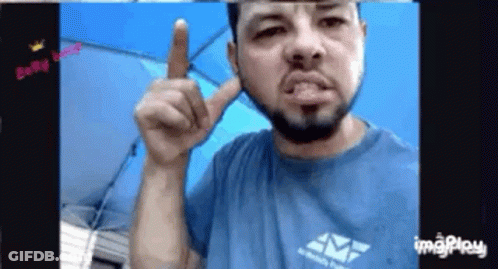 Bearded Man In Blue Shirt Pointing GIF