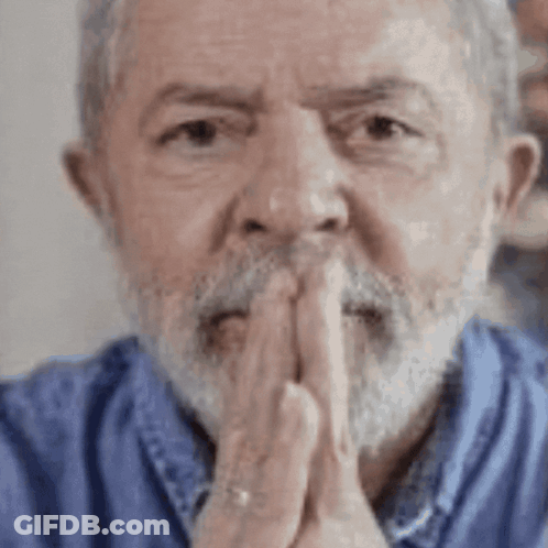 Bearded Man In Blue Shirt Praying GIF