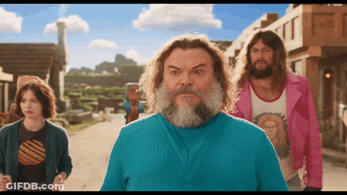 Bearded Man In Blue Shirt With Group GIF