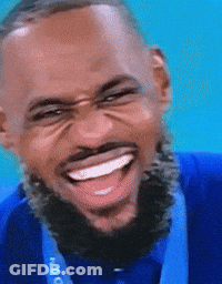 Bearded Man In Blue Shirt With Medal GIF