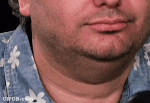 Bearded Man In Blue Shirt With White Flowers GIF