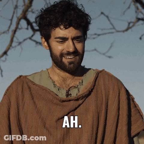 Bearded Man In Brown Robe Saying Ah GIF