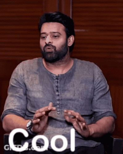 Bearded Man In Chair Saying Cool GIF
