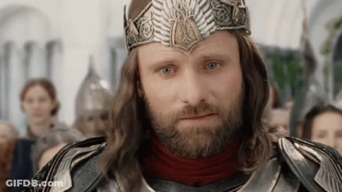 Bearded Man In Crown And Armor Before Crowd GIF