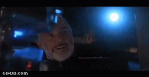 Bearded Man In Dark Room With Blue Lights GIF