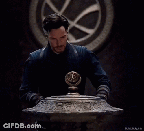 Bearded Man In Front Of Clock Looking GIF