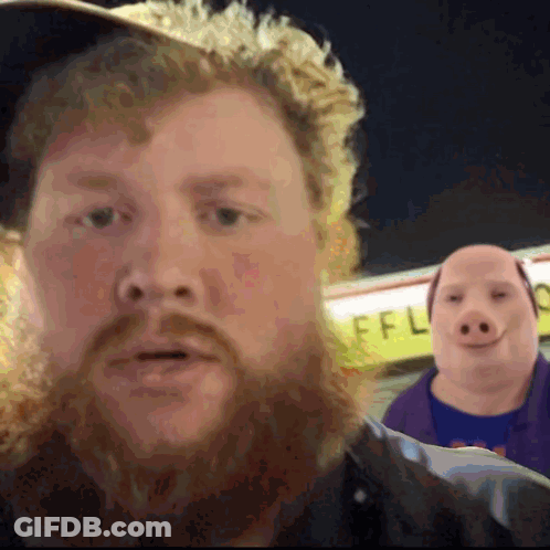 Bearded Man In Front Of Ffl Sign GIF