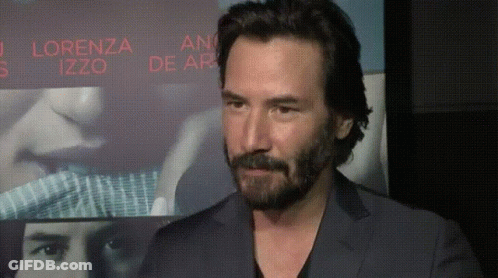Bearded Man In Front Of Screen Saying Lorenza Izzo GIF