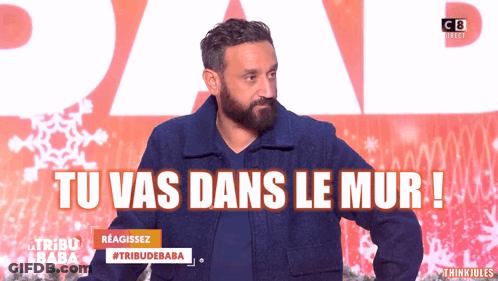Bearded Man In Front Of Tu Vas Dans Le Mur GIF