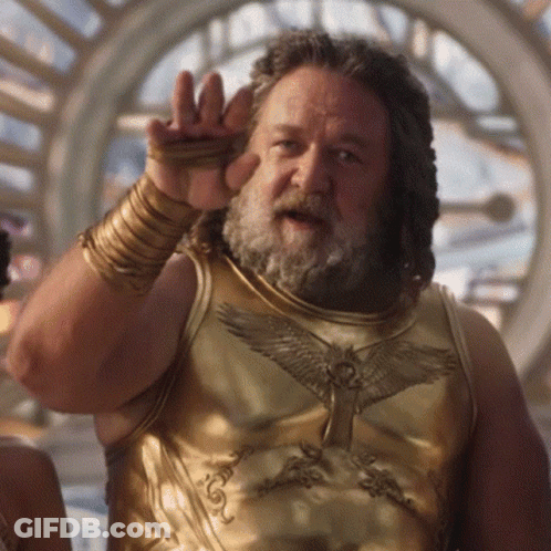 Bearded Man In Gold Armor With Wings GIF