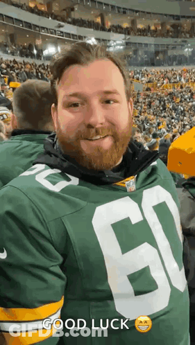 Bearded Man In Green Bay Packers Jersey At Stadium GIF