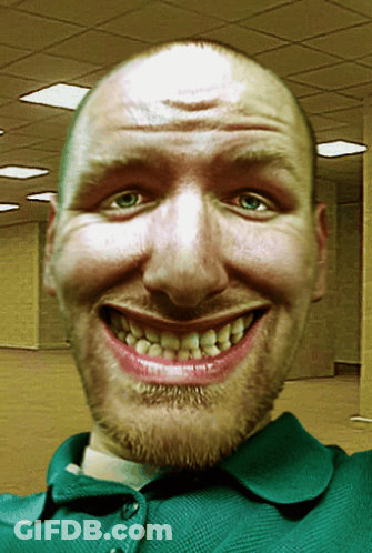 Bearded Man In Green Shirt Smiling GIF